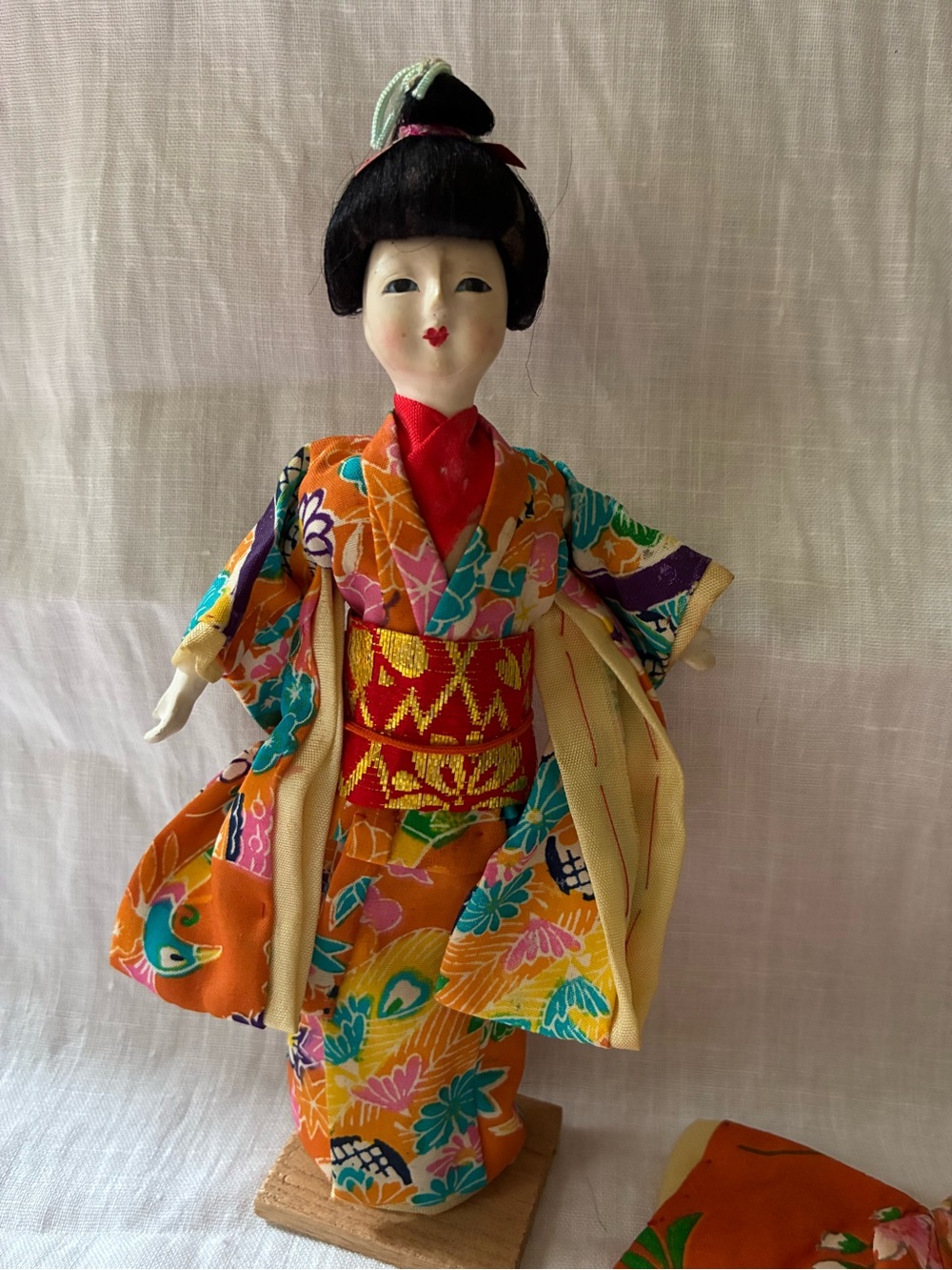 Traditional Japanese Geisha Doll in Orange Kimono